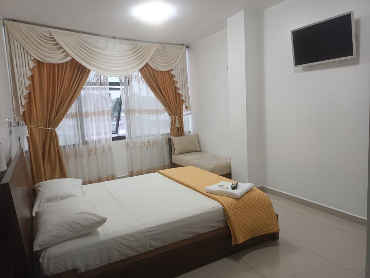Hotel Quezada Hermanos ซานโต โดมิงโก เด ลอส โคโลราโดส ภายนอก รูปภาพ
